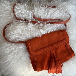 Women's Suede Crossbody Bag in Rust with Tassel